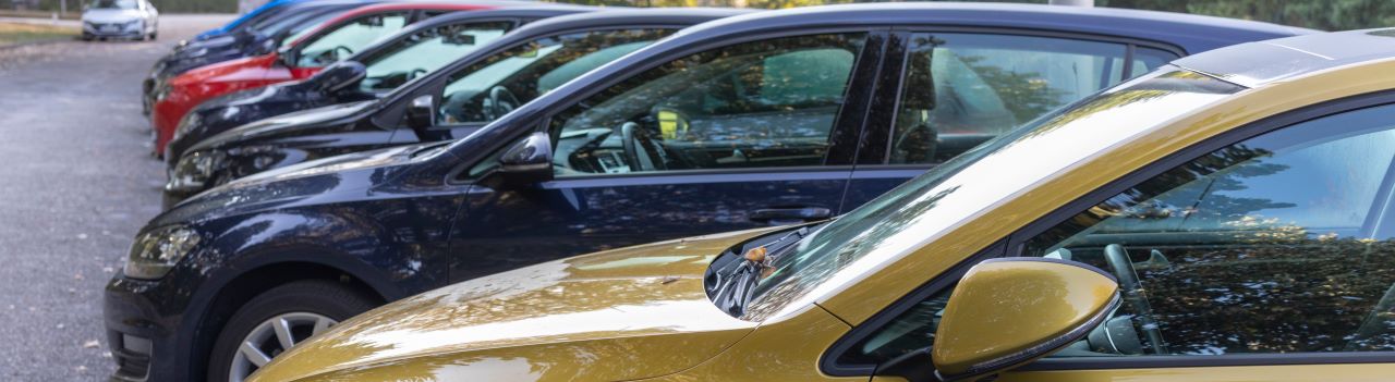 A lineup of high-quality used cars for sale at Hall's Auto Sales in Mansfield, OH, showcasing a variety of makes and models.