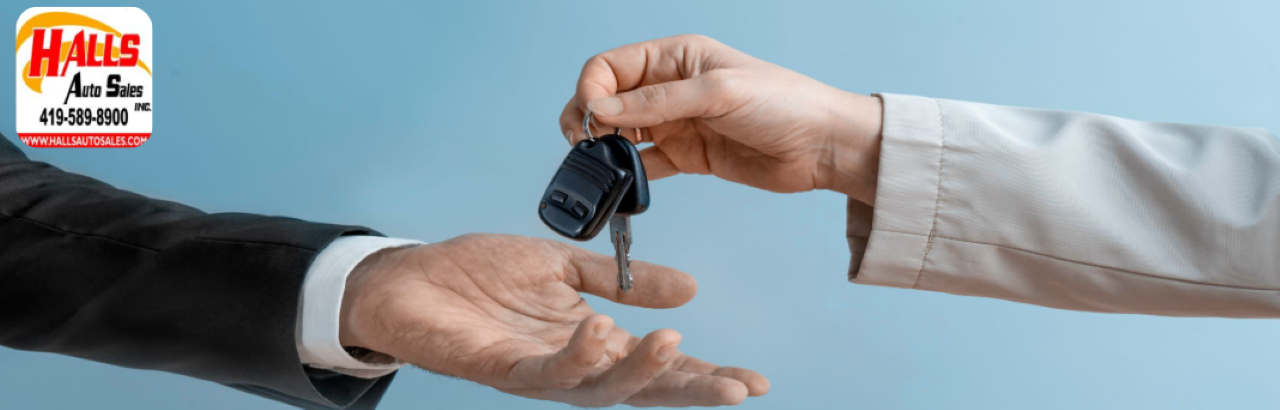 Used cars lined up at Hall’s Auto Sales in Mansfield, ready for trade-in or cash offers.