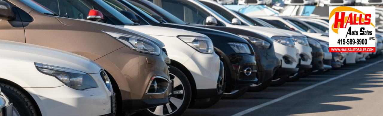 Used cars lined up for sale at Hall’s Auto Sales in Mansfield, OH